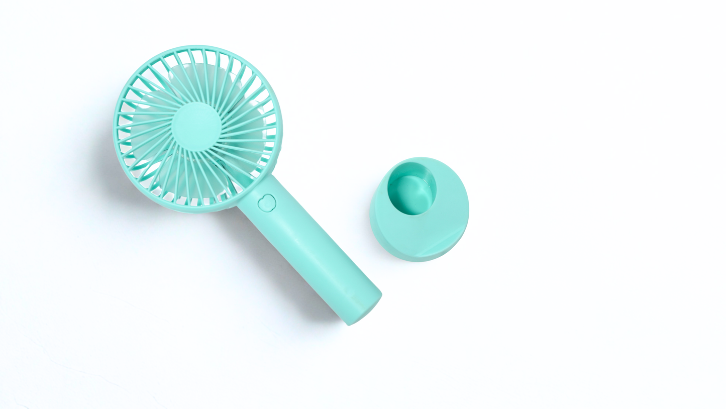 Portable Handheld Fan – Compact and Rechargeable, Cool Down Anywhere, Ideal for Travel and Outdoor Use